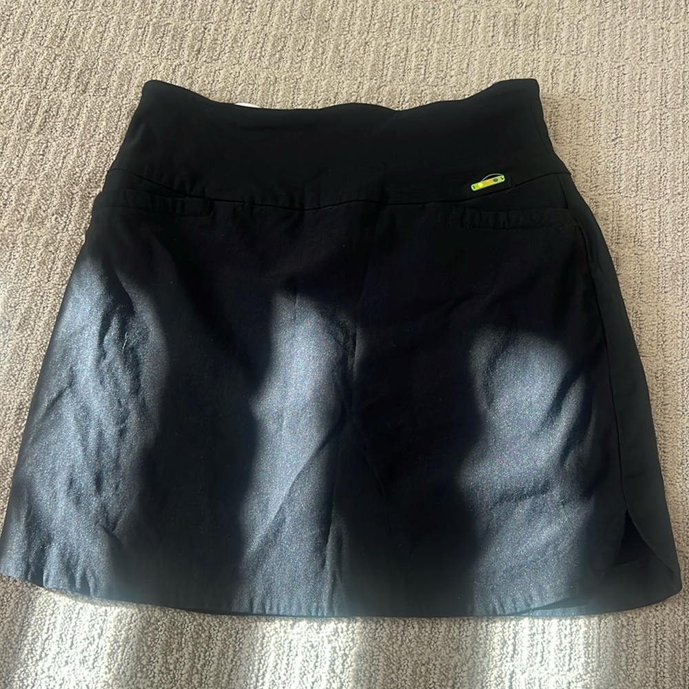 Swing control golf skirt
